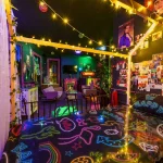 Fairy Light Canopy Neon Floor Art Be Happy Seating Area — The Mad House Dean Street, Newcastle