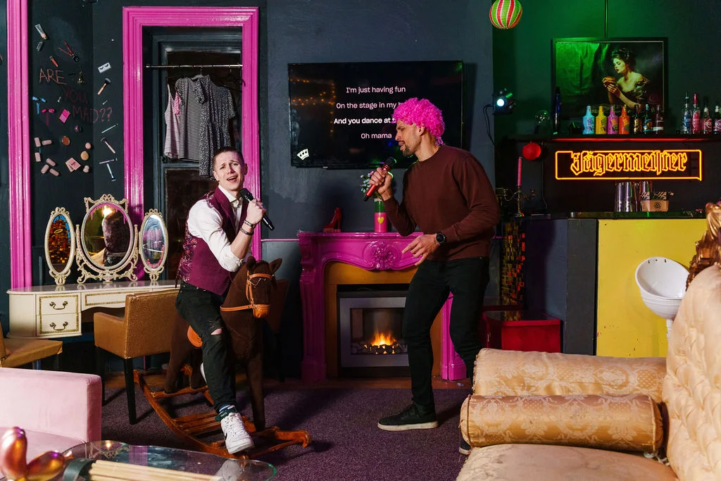 Karaoke Two Men Singing Jagermeister Bar Neon Lighting — The Mad House Dean Street, Newcastle